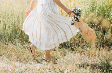 woman natural clothes eco mesh string bag wildflowers