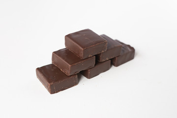 Chocolate candies on a white background.