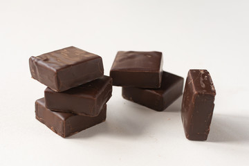 Chocolate candies on a white background.