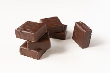 Chocolate candies on a white background.