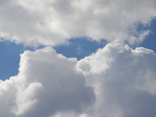 Fluffy clouds zoom shot, day time