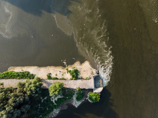 Naklejka premium Ecological disaster, sewage discharge to the Vistula river near Warsaw, Poland