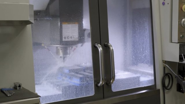 milling machine and control panel at the factory. 4K