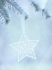 Fototapeta na wymiar Christmas decoration with snow on winter nature background