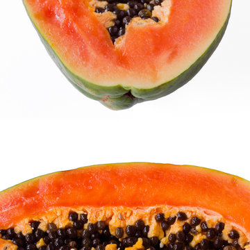 Papaya creative layout on a white background. Tropical fruit food concept. Top view, flat lay. Colorful intese orange