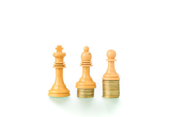 Conceptual photo with chess pieces and coins showing the concept of social equity.