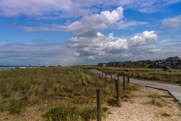 Fototapeta premium Image of the beautiful city, dikes and sandy beaches on the shores of the North Sea, Katwijk, Netherlands