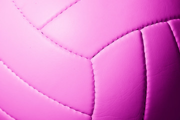Closeup detail of volleyball ball texture background. Pink filter