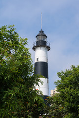 Fototapeta premium The black and white striped lighthouse of the Miraflores district of Lima, Peru