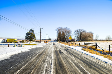 Icy Country Road In A Snowy Farmland Small Town On A Bright And Sunny Winter Day, Ellensburg, WA, USA