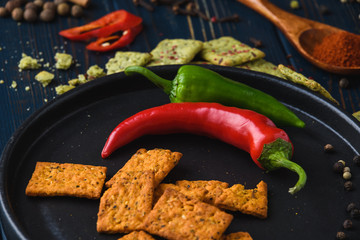 Garlic pepper paprika on a wooden spoon and spices