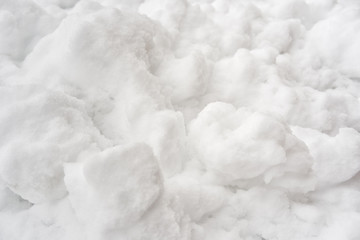 Block of white snow. Winter background. 