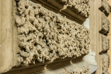  textured facade bricks close-up during daylight hours