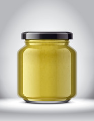 Glass Jar with Mustard on Background. 