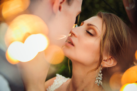 Portrait photos of a couple in love with a beautiful light.Wedding photo beautifully blurred background
