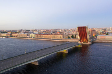 Obraz premium The divorced Liteyny Bridge in the early June morning. White nights in St. Petersburg. Russia