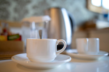 Electric Kettle and cups coffee time