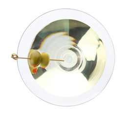 Glass of Classic Dry Martini with olives on white background, top view