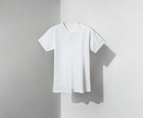 White T-shirt on shadowed background