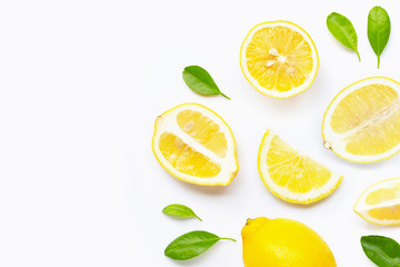 Fresh lemon with slices isolated on white.