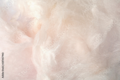 Sweet light cotton candy as background, closeup view