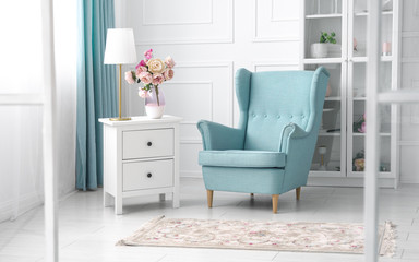 Classic blue and white theme living room - light blue armchair in white room