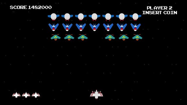 1980's Old Video Game of Spaceship Shooting on Aliens