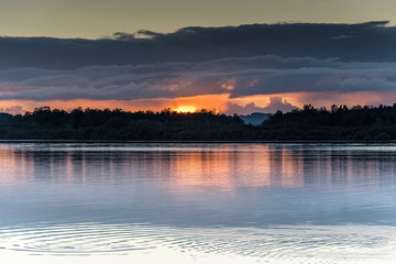 Sunrise Waterscape with Low Cloud Bank