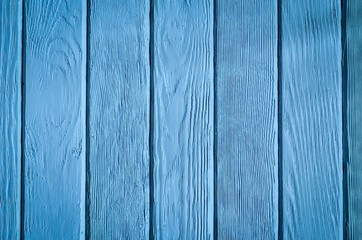 Wooden background texture. Creatively painted intense blue boards.