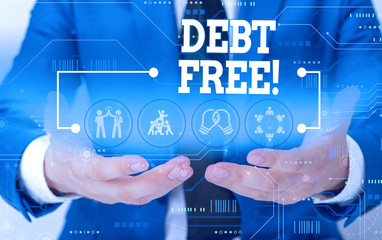 Conceptual hand writing showing Debt Free. Concept meaning does not owning any money or things to any individual or companies Male wear formal suit presenting presentation smart device
