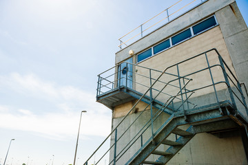 Steel staircase to surveillance building - vintage architecture of the hydroelectric power plant at Centrale Hydroelectrique de Gambsheim