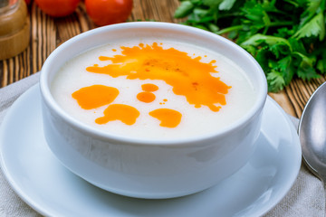 Turkish soup of iskembe on wooden table