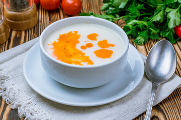 Turkish soup of iskembe on wooden table