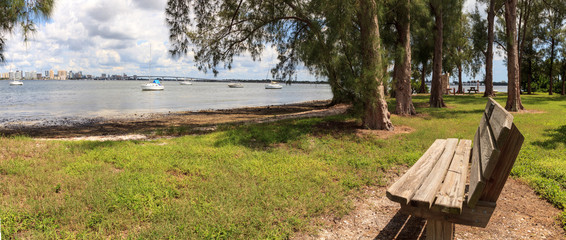 Bench view of Boats at the Ken Thompson park in Sarasota