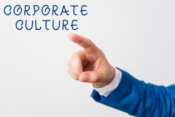 Word writing text Corporate Culture. Business photo showcasing pervasive values and attitudes that characterize a company Isolated hand pointing with finger. Business concept pointing finger
