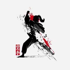 Martial arts silhouette character logo illustration. Foreign word in japanese means Karate. © mysmara