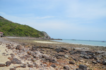 Fototapeta na wymiar stones rock coast of the sea blue sky thailand