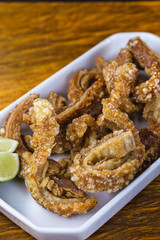 Traditional Brazilian recipe for pork crackling called pork crackling. Traditional Brazilian food, fried and crispy pork.