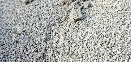 Mineral fertilizer of cereal in the agricultural industry. Nitrogen, phosphorus and potassium to strengthen the grain. Manure balls. Industrial quantity of nutrient for agriculture.