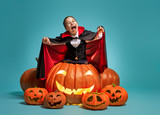 little Dracula with  pumpkins