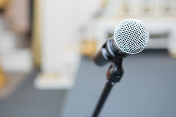 microphone in seminar room on blurred background
