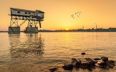 Abandoned coal loader in the Danube river. Near by Esztergom.