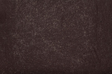 Obraz premium Blank black blackboard with chalk powder traces erased on texture background.