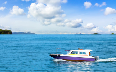 Speed ​​boat in the sea with blue sky