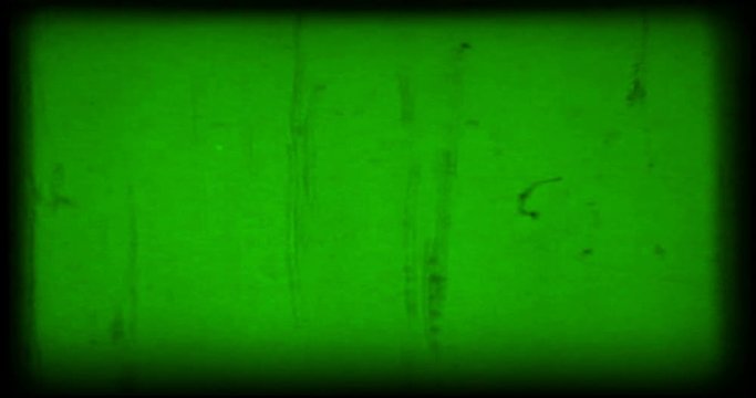 green vintage old grunge film strip frame background, old movie damage flicker effect, retro movie glitch effect with spot and dust on chroma key green screen