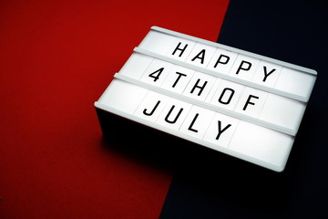 Top view Happy 4th of July light box with space copy Flat lay