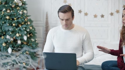 Handsome business man keeping calm at remote workplace.