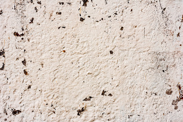Texture of a concrete wall with cracks and scratches which can be used as a background