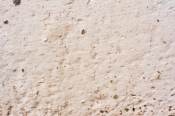 Texture of a concrete wall with cracks and scratches which can be used as a background
