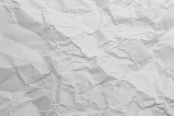 The background or the surface of the paper is wrinkled as the copy space.